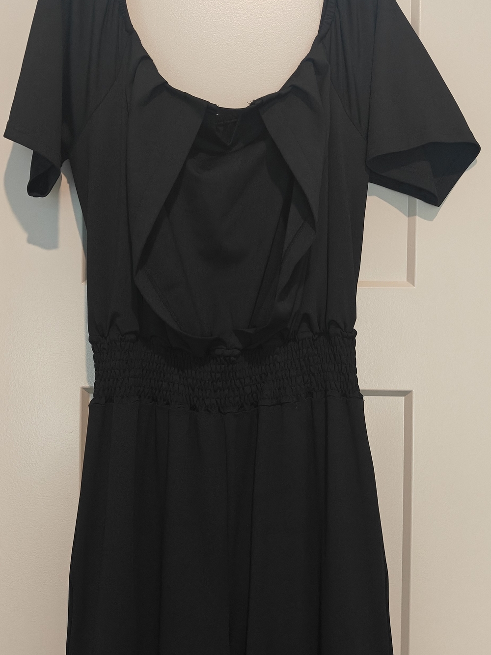 Elegant Black Short-Sleeve Jumpsuit with Smocked Waist